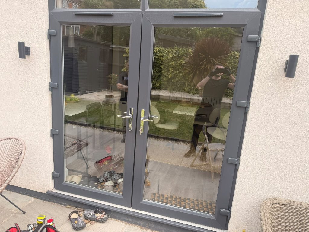Anthracite uPVC French doors with a new multipoint lock and chrome handles fitted this week by Max the Locksmith in Nottingham