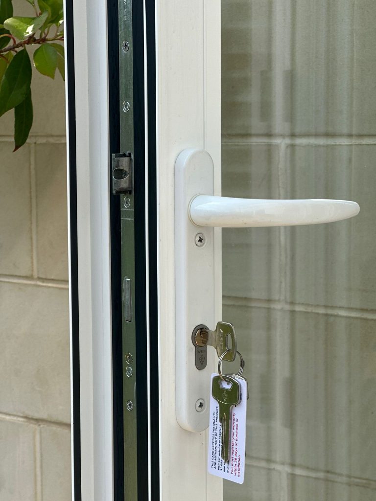 New cylinder and shootbolt keeps on a white uPVC side door in Mansfield Woodhouse