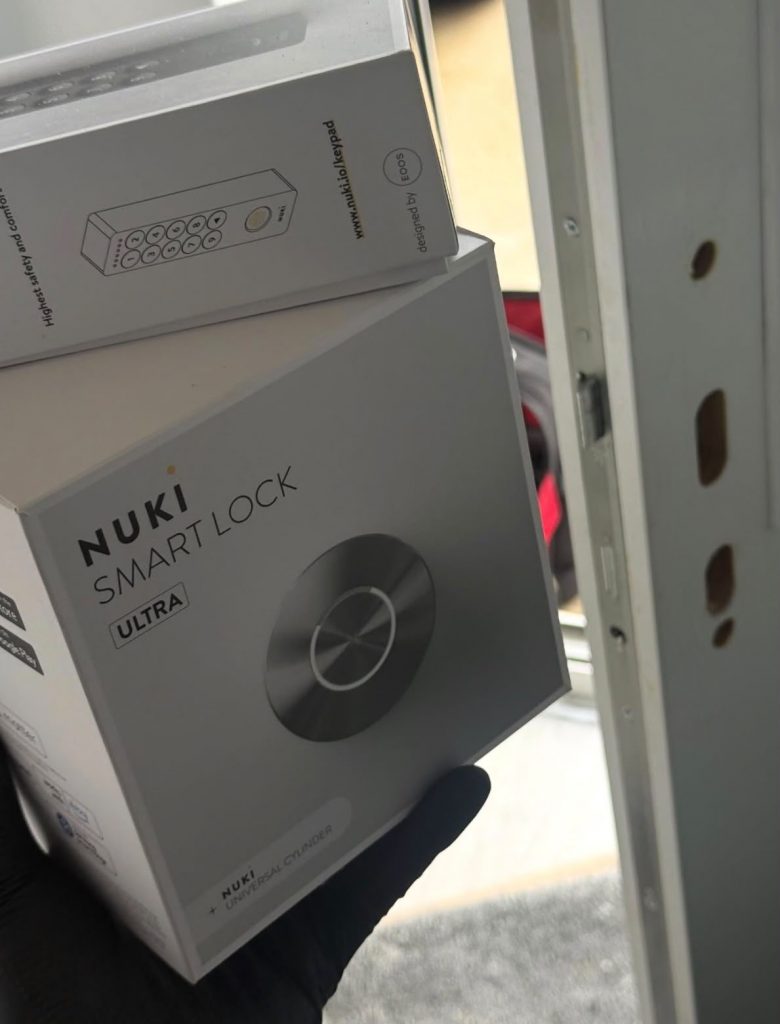 Nuki smart lock and keypad boxed ready for fitting on a door in Wollaton