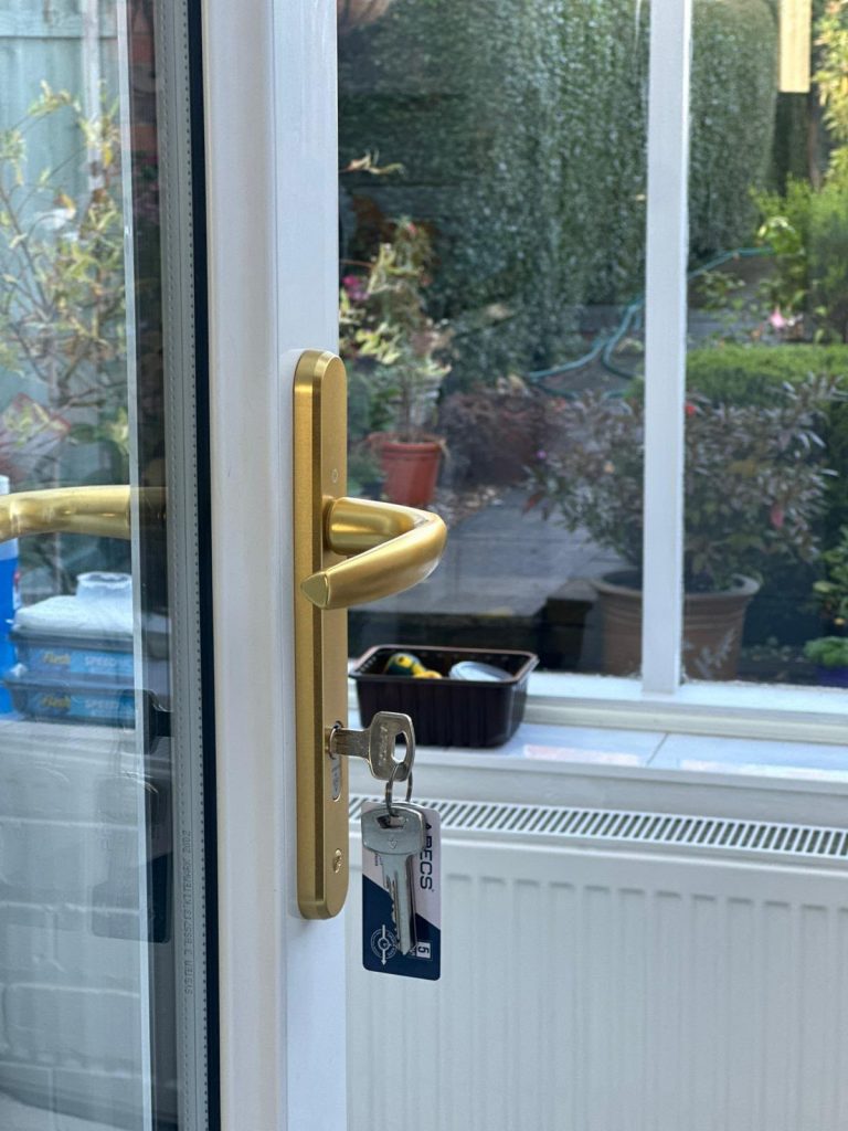 New gold handles and TS007-rated anti-snap cylinder fitted after a uPVC door multipoint mechanism replacement in Nottingham